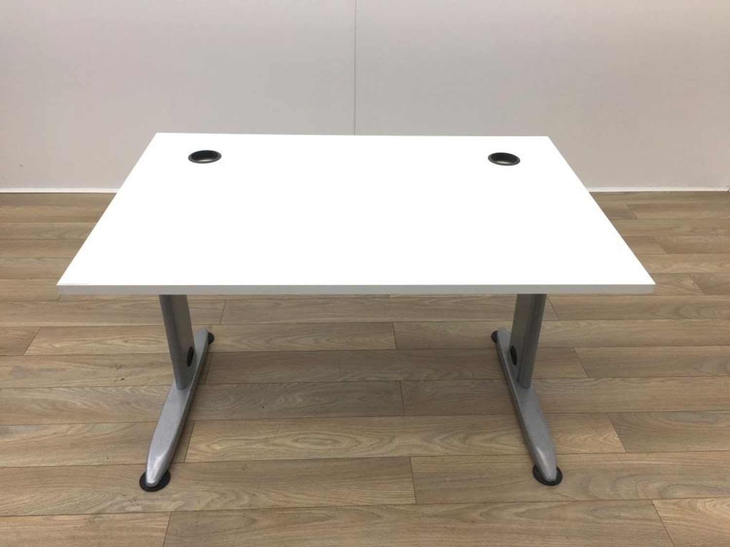 white desk with adjustable frame